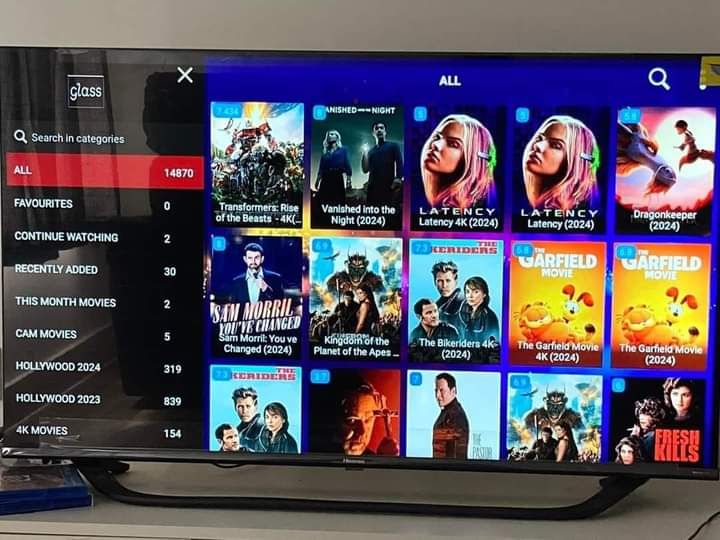 Smart TV interface displaying Garox TV sports channels and program guide